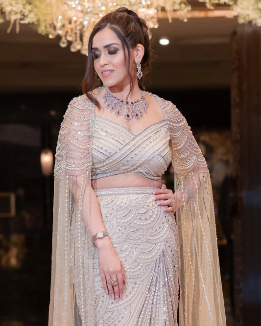 Ivory Drape Sleeve Top And Skirt